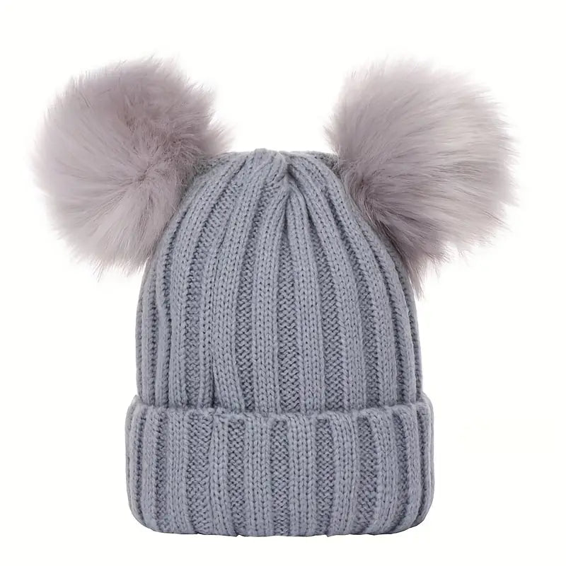 Dames winter muts met pompoms