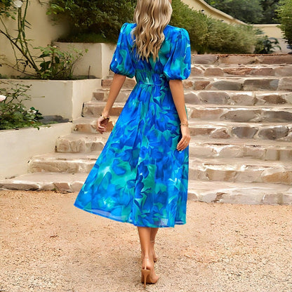 Penelope | Charmante Midi-jurk met V-hals en Print