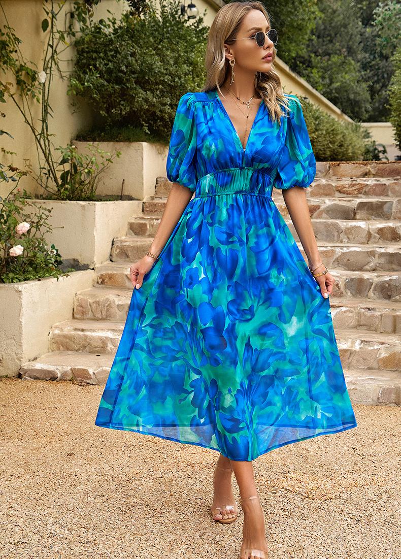 Penelope | Charmante Midi-jurk met V-hals en Print