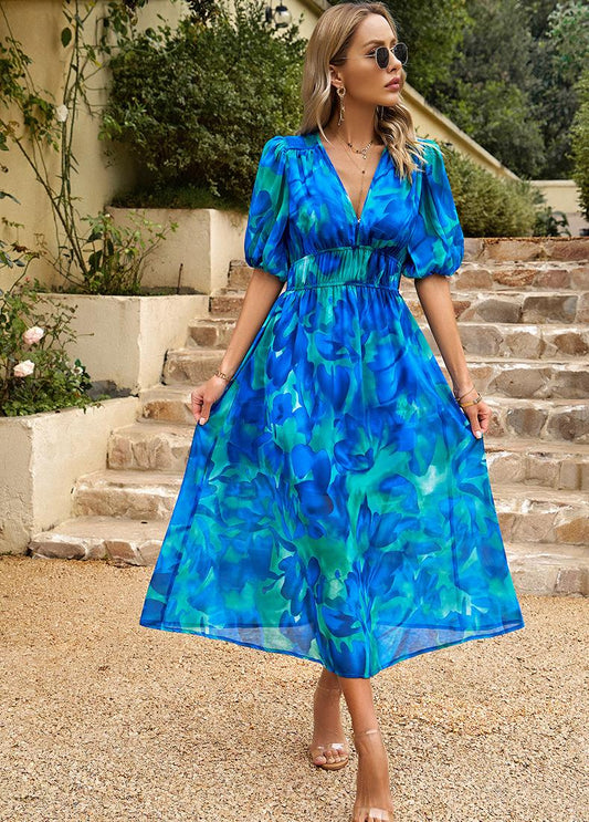 Penelope | Charmante Midi-jurk met V-hals en Print