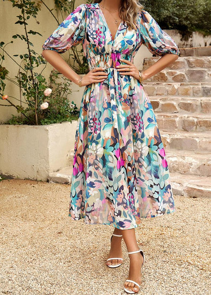 Penelope | Charmante Midi-jurk met V-hals en Print